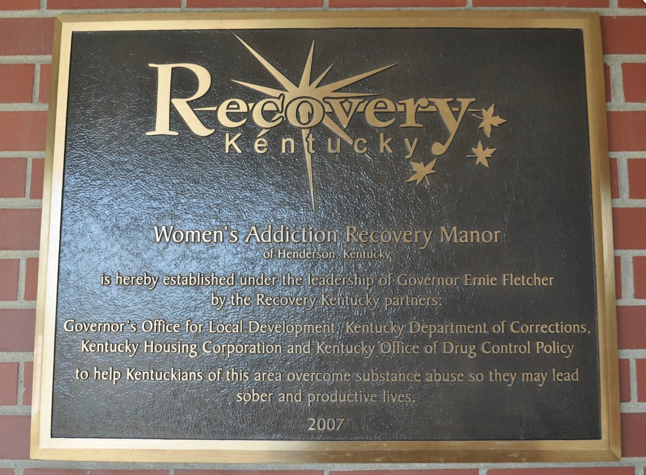 WARM RECOVERY PLAQUE ON ENTRANCE